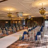 Blue chair settings and Aisle ready for ceremony