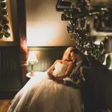 Couple sharing a moment in thehoneymoon suite at Cornhill Castle