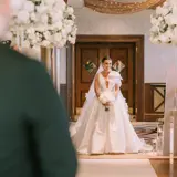 Bride and groom seeing each other for the first time on their wedding day