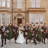 Wedding party walking outside of Lynnhurst