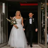 Couple leaving Redhurst after being married