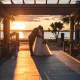 Couple kissing at sunset at the Brisbane House Hotel, a twilight wedding venue in Ayrshire, Scotland.